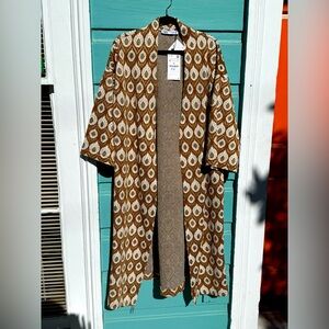 A jacket from Zara with original tags still on